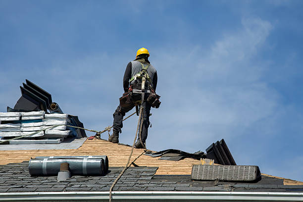 Professional Roof Replacement technician working in Harperville, MS